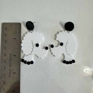 Cute French Poodle black faux diamond pierced earrings on white acrylic.